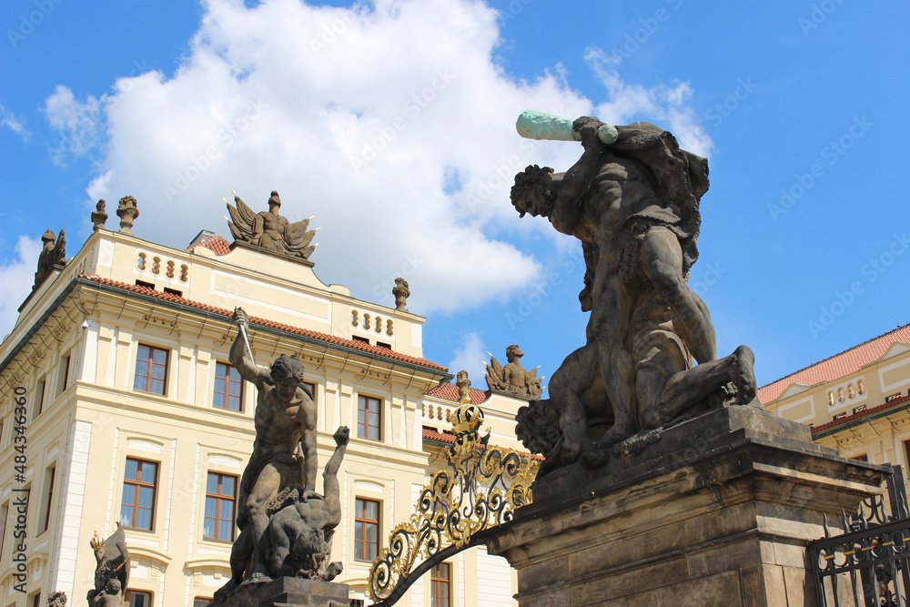 Prague Castle main gate statue, detail, in summer with white clouds