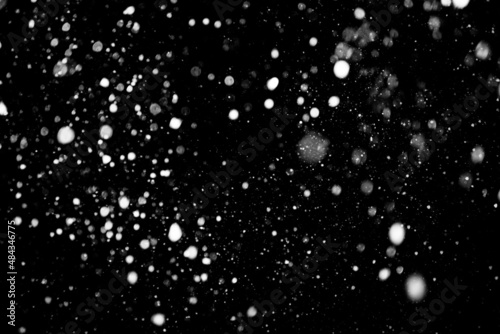 Falling snow background. Defocused. Winter Magic