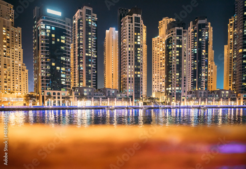 Beautiful Night view of Skyline Dubai Marina. Dubai Marina Towers. Dubai Marina Skyline Background. Holidays In United Arab Emirates. Vacation In UAE. Night view of high-rise buildings in Dubai Marina © Grigory Bruev