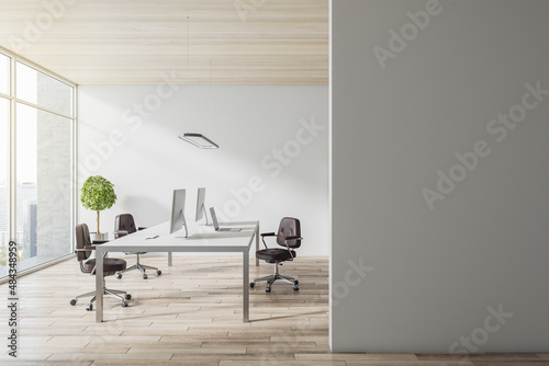 Modern concrete office interior with empty white mock up place on wall  wooden flooring and ceiling  equipment  furniture and window with city view  daylight. 3D Rendering.