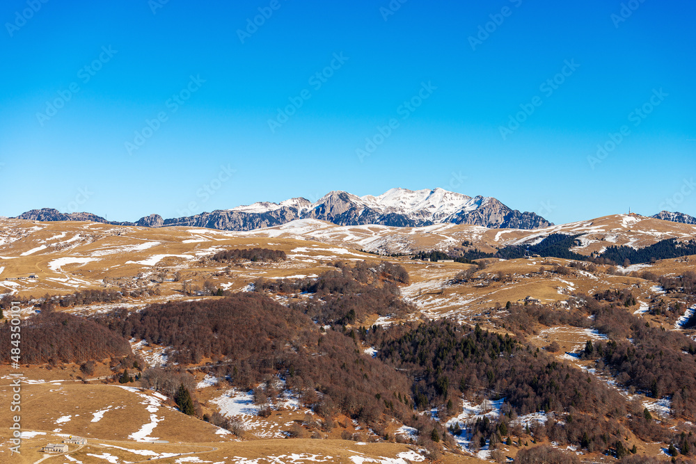 Lessinia High Plateau Regional Natural Park (Altopiano della Lessinia) and mountain range of the Monte Carega (small Dolomites), winter landscape, Erbezzo, Verona province, Veneto, Italy, Europe.