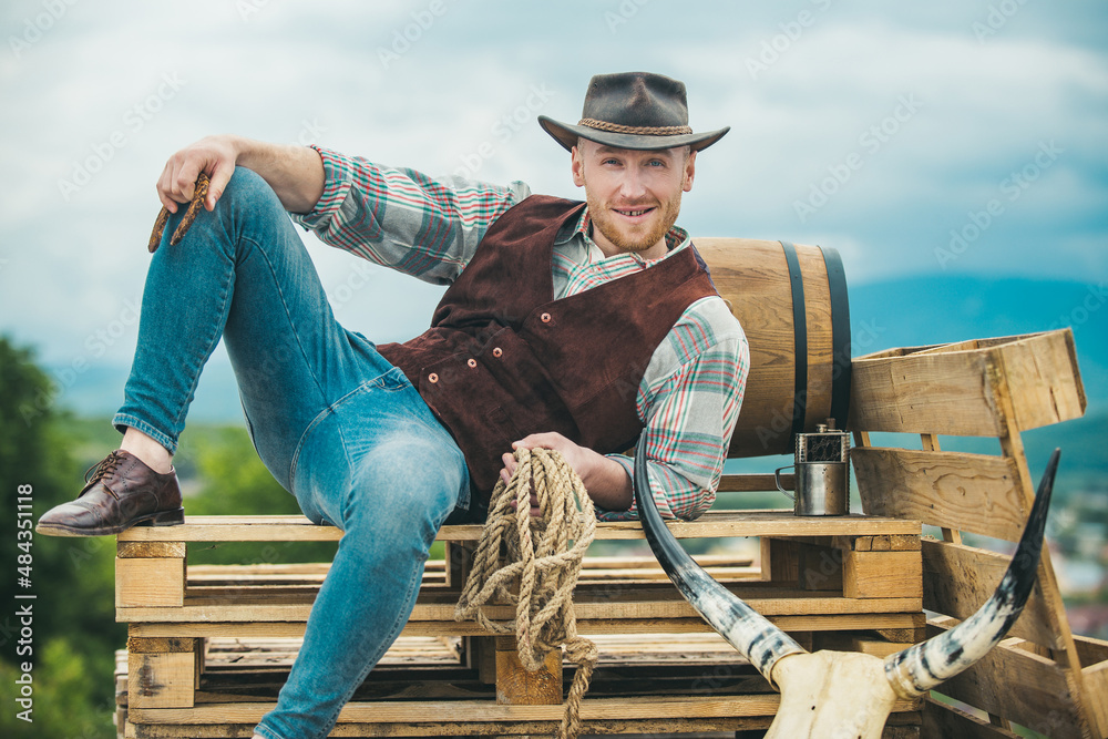 Sexy western man with cowboy hat. Men retro fashion, vintage vogue, brutal male model. Sexy western man with cowboy hat. Men retro fashion, vintage vogue, brutal male model.