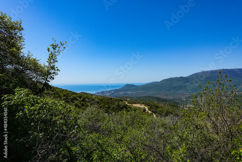 View of the Crimean Mountains plateau and the Black Sea from the top of the Demerdzhi. Russia.