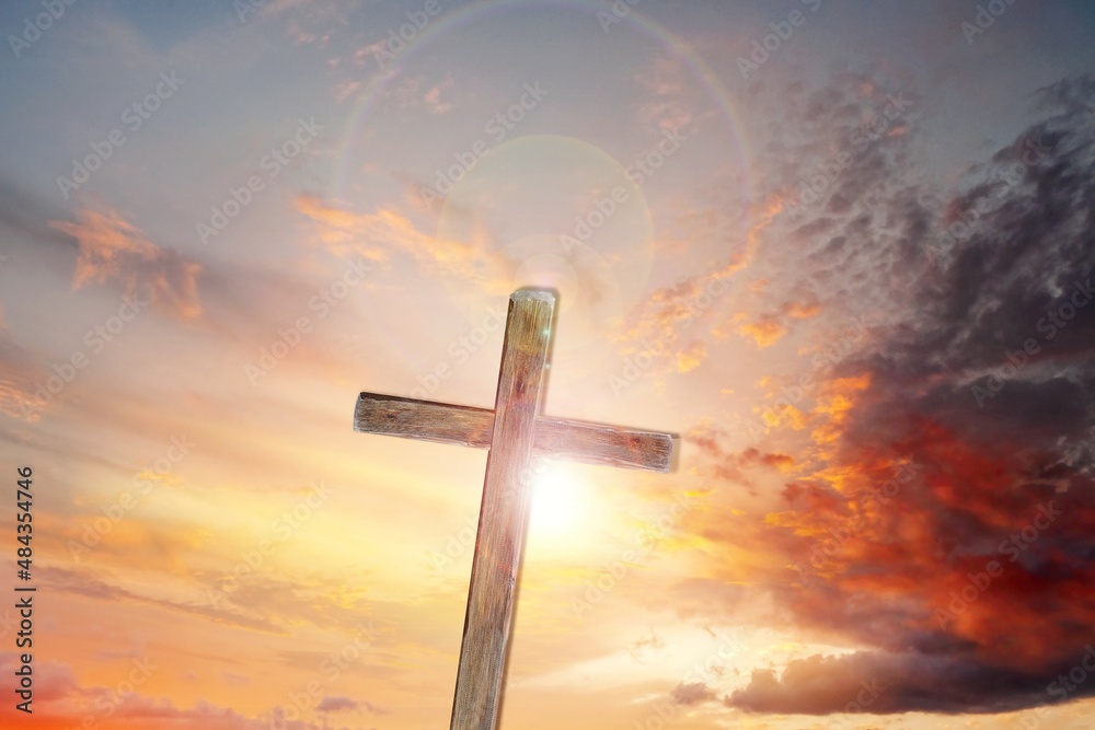The cross of God in the rays of the sun. Fundamentals of religions