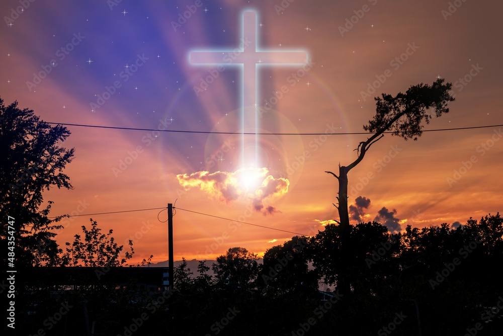 The cross of God in the rays of the sun. Fundamentals of religions