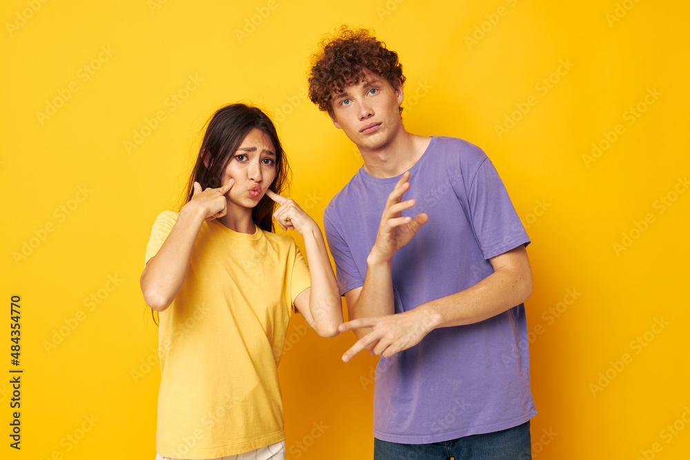 teenagers in colorful t-shirts posing friendship fun isolated background unaltered teenagers in colorful t-shirts posing friendship fun isolated background unaltered