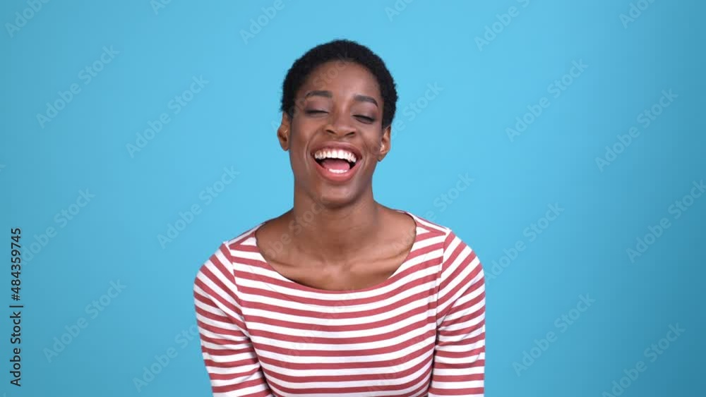 Excited lady celebrate trans community fist up isolated blue color background Excited lady celebrate trans community fist up isolated blue color background