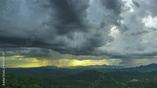 4K time-lapse video motion, rain storms and black clouds moving over the mountains In the north of Thailand, Mae Moh district, Lampang.
