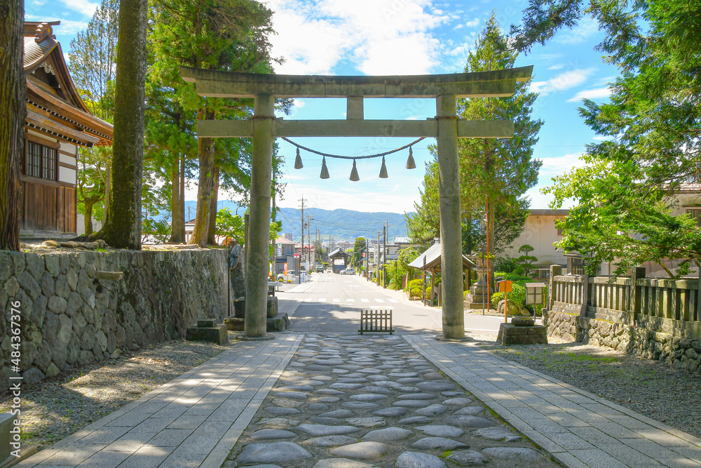 Japanese gate, Torii is with chirping of cicadsas in the bright and beautiful summer.