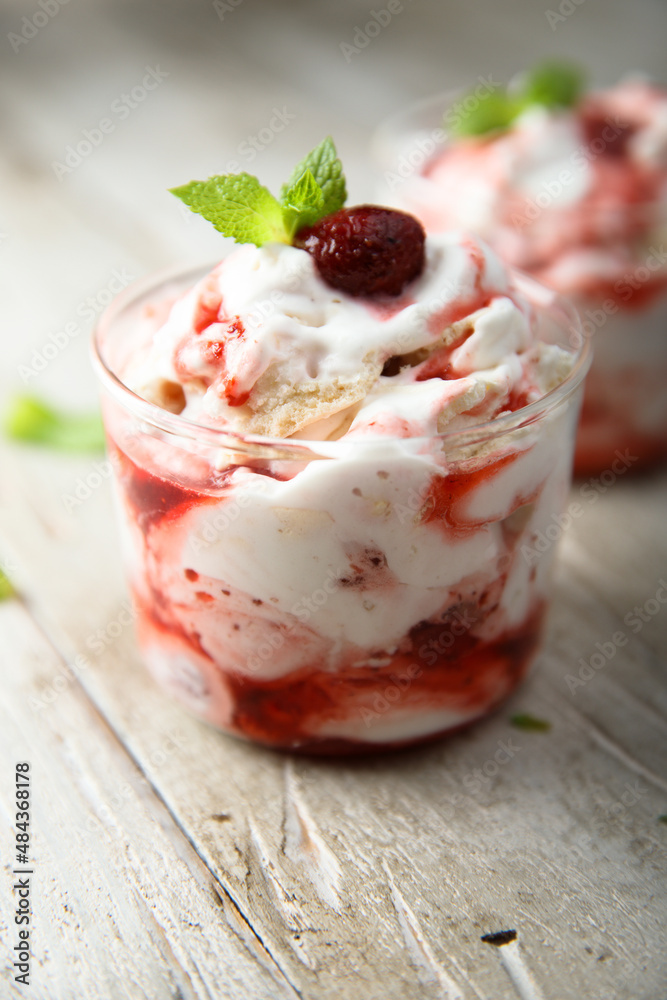 Homemade meringue dessert with raspberry and cream Homemade meringue dessert with raspberry and cream
