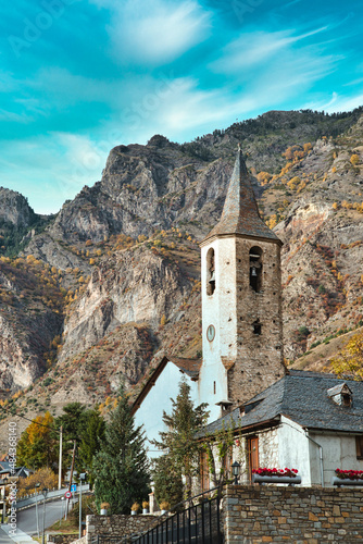 Church of the town of espot in the background the catalan pyrenees. catalonia, spain. photo
