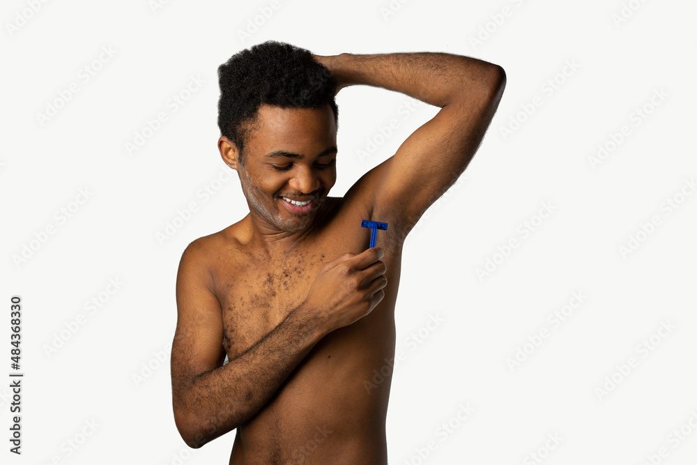 Young american male shakes on white background 