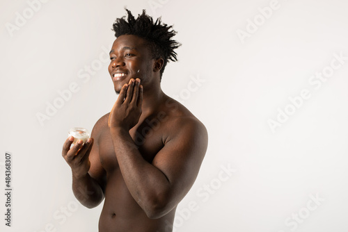 Portrait of African male with face cream 