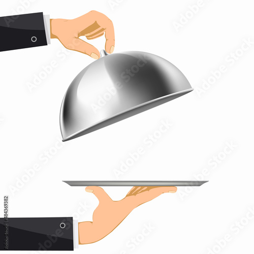Waiter opens the cloche of the tray.