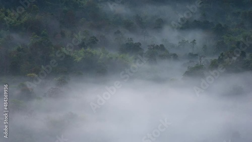 Time lapse 4K Aerial view motion. Rain forest and morning fog, Pang Puai, Mae Moh, Lampang, Thailand.