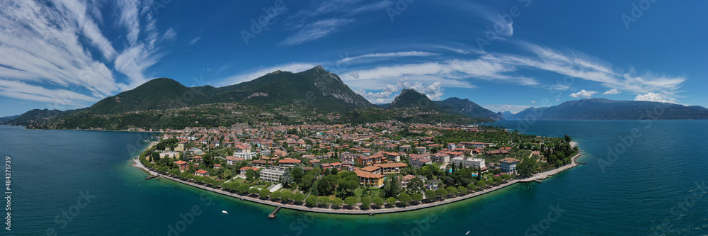 Aerial panorama of the historic part of the city of Toscolano Maderno on Lake Garda. Toscolano Maderno panorama, Italy aerial view.