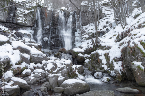 Cascate del Dardagna in inverno con la neve ed il ghiaccio photo