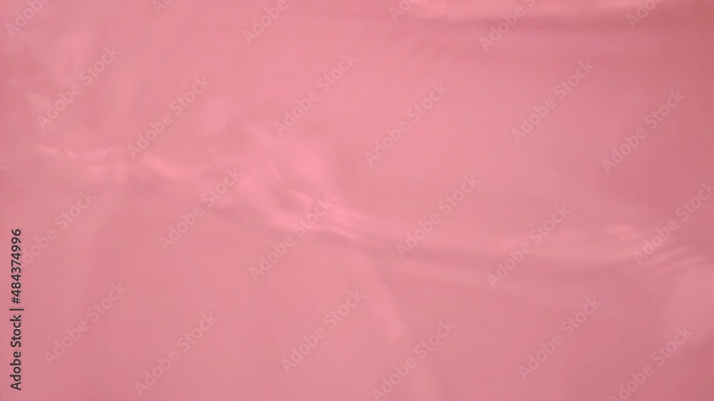 Abstract Background from Coral Pink Clear Water, Liquid in Sunlight. Abstract Background from Coral Pink Clear Water, Liquid in Sunlight.