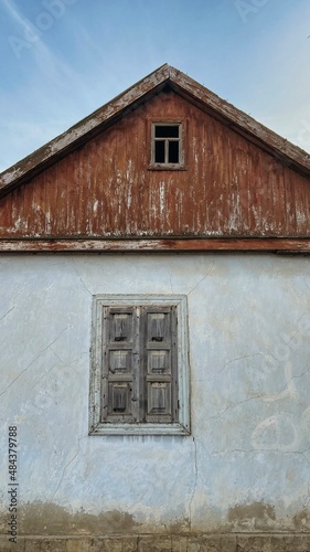 house with misaligned windows © Ирина Журавлева