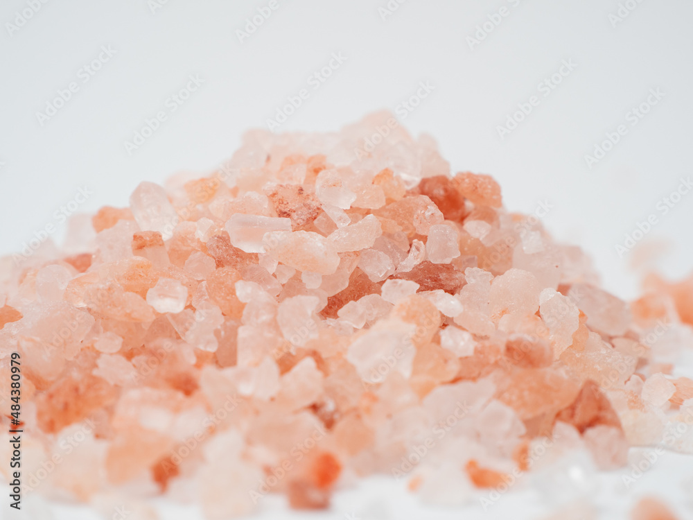 Pink salt on a white background. Pink salt on a white background.