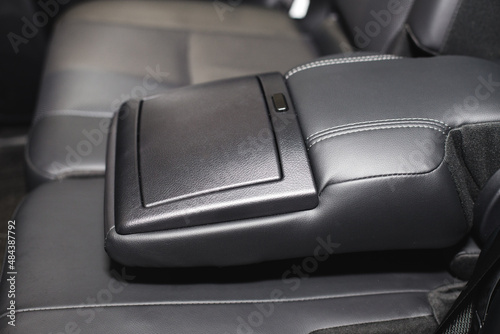 Luxury car rear seat cup holders with control panel