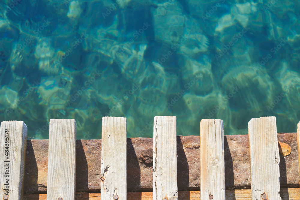 Sea close up and wooden bridge  Nature background