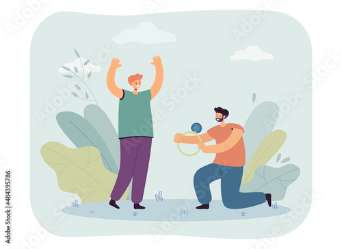 Happy man proposing to girlfriend flat vector illustration. Woman rejoicing while boyfriend kneeling and holding out engagement ring. Marriage concept for banner, website design or landing web page