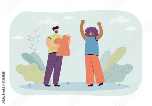 Man giving new T-shirt to girlfriend flat vector illustration. Happy woman raising hands up, rejoicing at gift from boyfriend. Present, love concept for banner, website design or landing web page