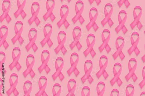Ribbon pink bow breast cancer awareness. Ribbon bow wallpaper pattern with copy space.