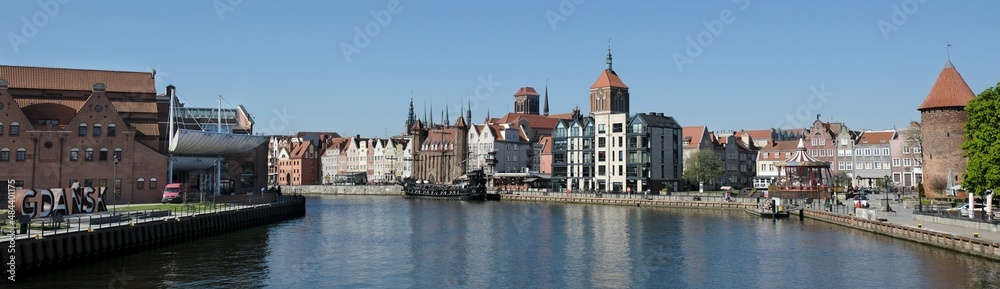 Panorama of Old Town in Gdansk and Motlawa river with ships.