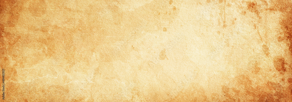 Naklejka premium Vintage texture of brown paper with spots and smudges