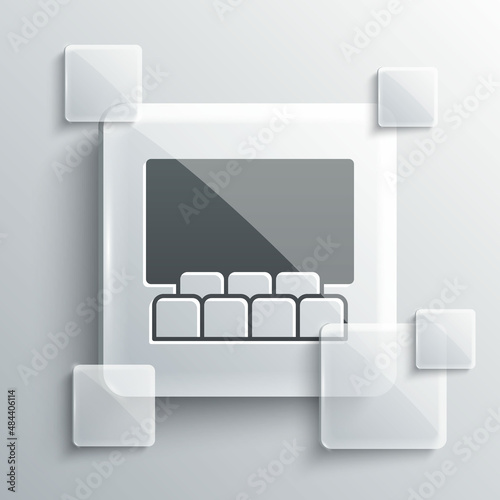Grey Cinema auditorium with screen icon isolated on grey background. Square glass panels. Vector