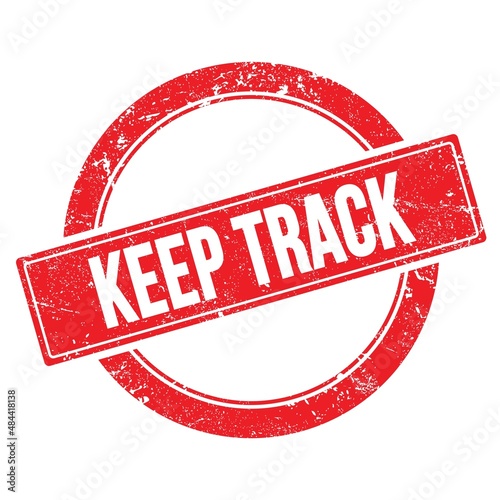 KEEP TRACK words written on red round stamp