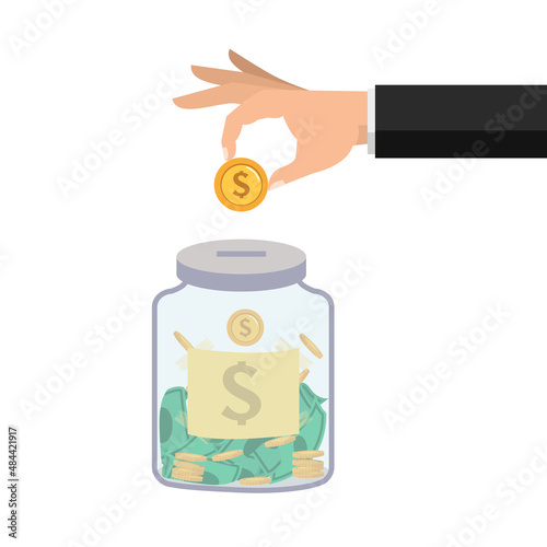 Hand  businessman putting coin in jar