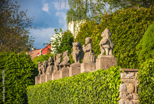Baroque stony figures of the Dwarf Cabinet near Castle of Nove Mesto nad Metuji, Czech Republic.