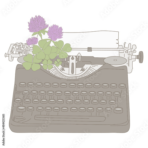 typewriting machine with  shamrock flower