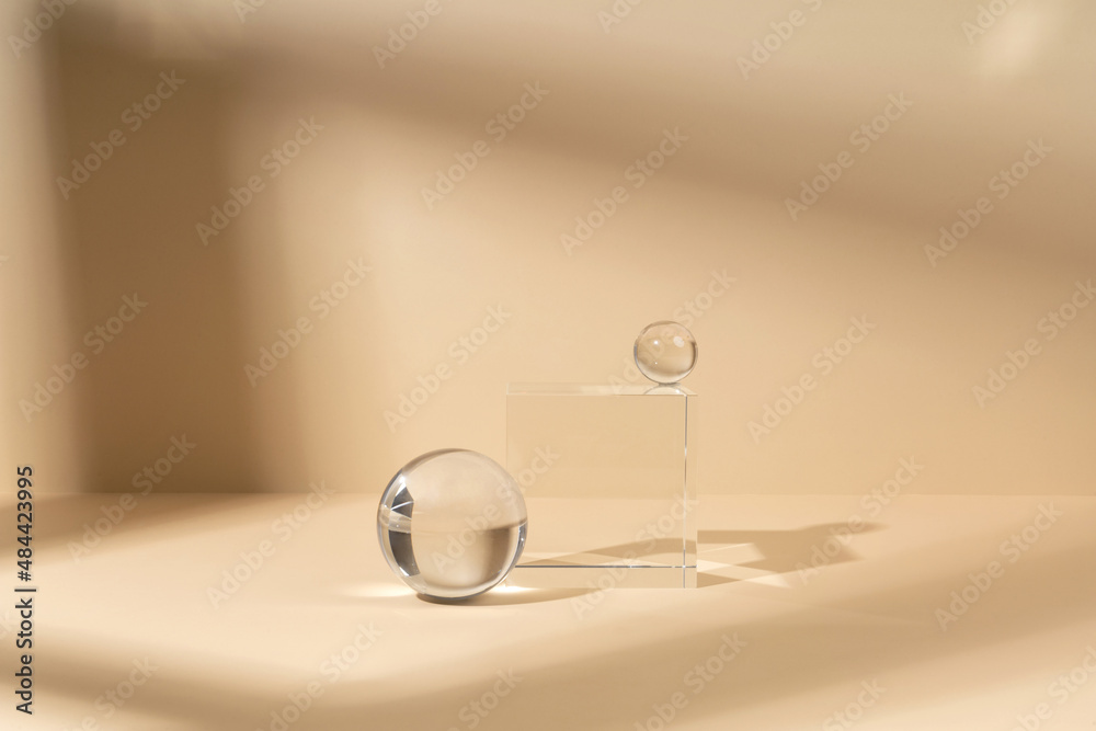 Skincare and cosmetic product showcase stand photography for online marketing include crystal ball and crystal cube stand on beige background