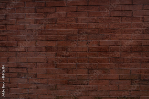 background in the form of a brick brown wall