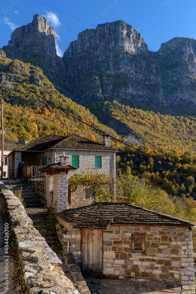 View of the traditional village Mikro Papigo with with the famous stone buildings during  fall season in  zagori Greece