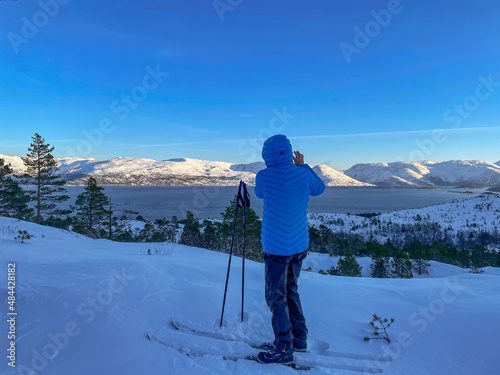 Woman on a ski tripi photo