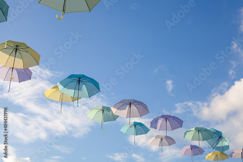 Colorful umbrellas background. Colorful umbrellas in the sky.