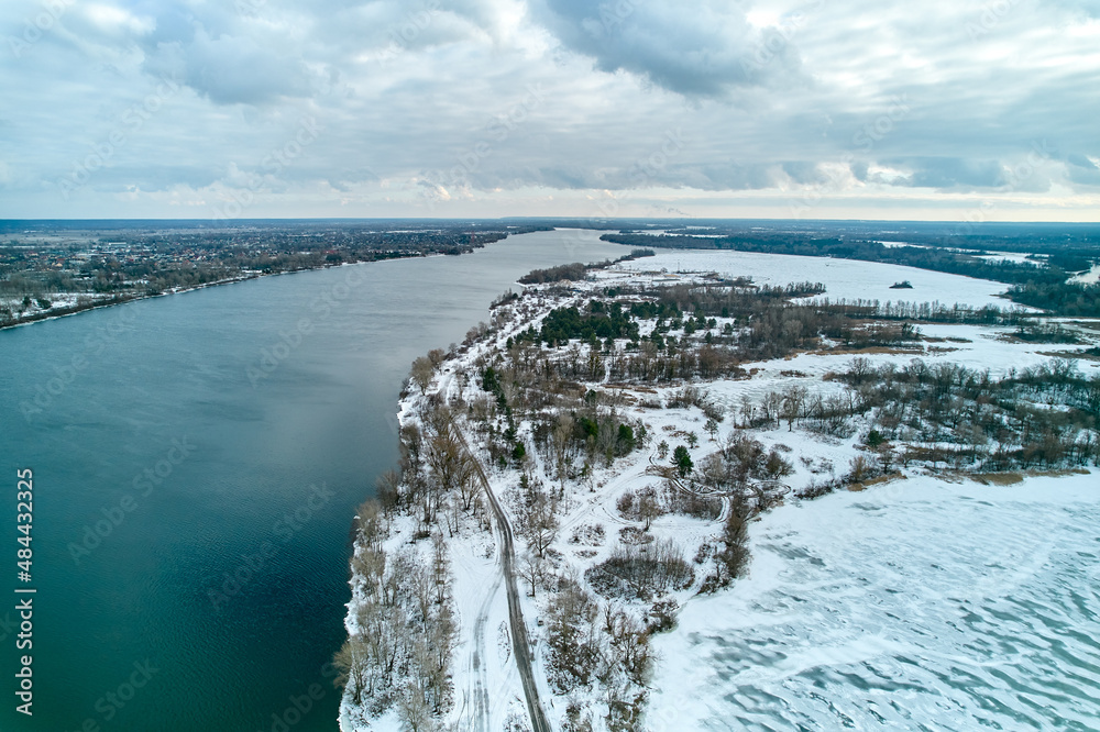 The bank of the Dnieper River in winter. Top view.