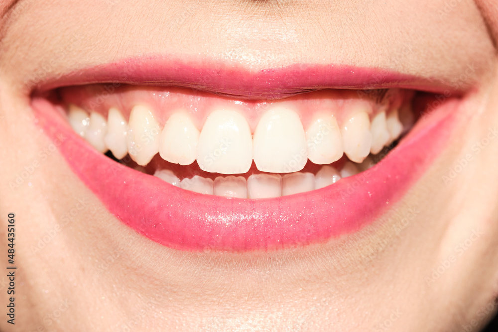 Anonymous woman with toothy smile Anonymous woman with toothy smile