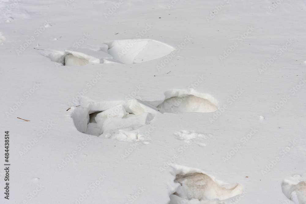 snow drift bank snow with foot steps snow drift bank snow with foot steps