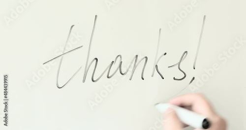Hand writing the word 