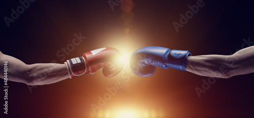 Two male hands in boxing gloves