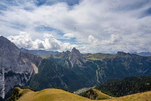 Beautiful view of Canazei with the Marmolada and Colac peaks. Dolomites.