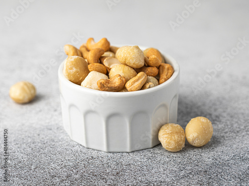 Canvas Print Macadamia cashew nut food photo in a ceramic bowl