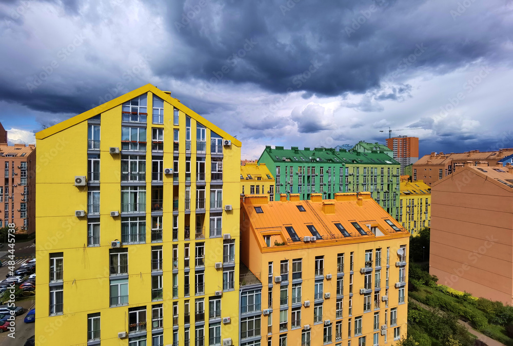 Street with colorful houses and beautiful exterior design in Kyiv, Ukraine. Aerial. Comfort town.