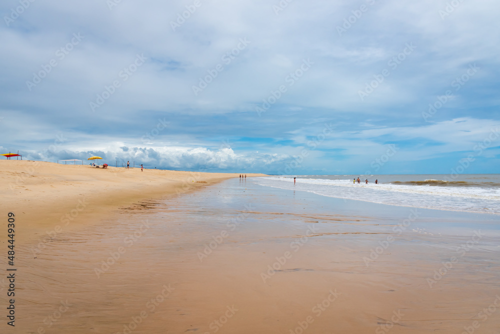 Guaratiba Beach and sky on a cloudy day during low tide in Prado, Bahia, Brazil